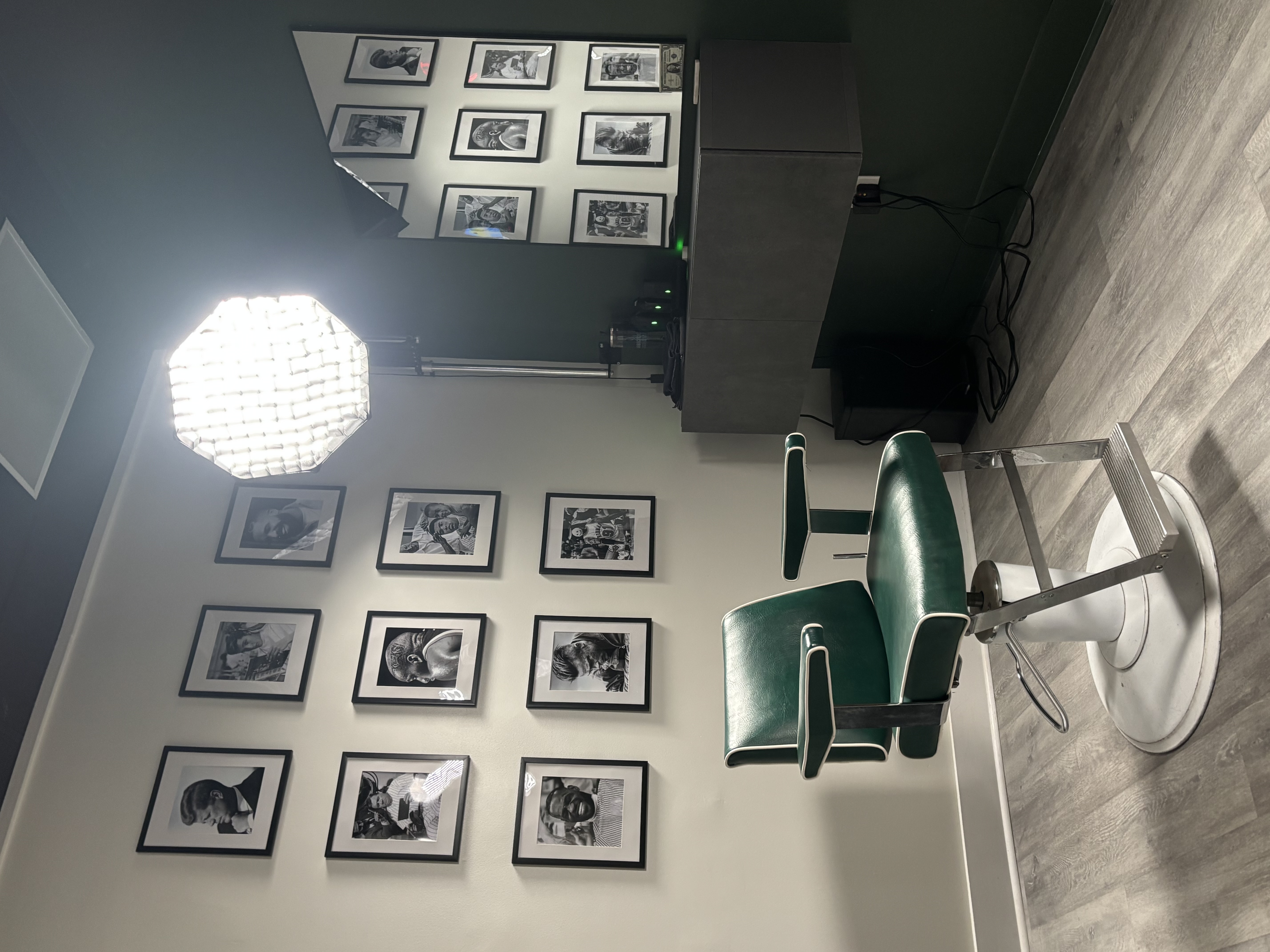 The barber chair and portrait wall, the other side of The Lounge